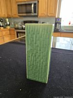 Green textured rectangular vase side view