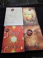 Front covers of all four hardcover books