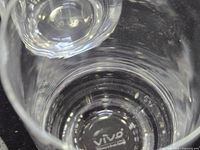 Close-up of glass base showing Vivo mark