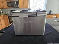 Front view showing stainless steel housing and Cuisinart logo