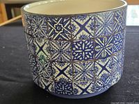 Front view showing full mosaic pattern on ceramic planter