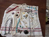 All jewellery pieces laid out on towel