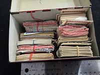 Open recipe box showing bundled coupons