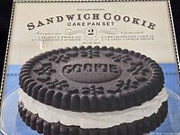 Retail box front showing product name and image of finished cake