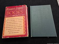 Front view of both books: Reader’s Digest Books with dust jacket and plain green cloth volume