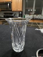 Clear crystal vase standing upright