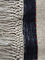 Close-up of fringe and selvedge showing weave detail