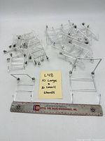 All 20 stands grouped with size mix, ruler for scale