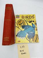 Spine of Birds of Canada hardcover and front cover of How and Why Wonder Book of Birds