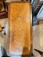 Top view of coffee table showing leather inlay and border