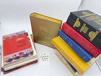 Overall lot showing binder, America’s Cook Book colour variants, softcover stack