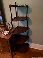Full view of five-tier wooden corner shelf