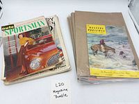 Stack of assorted magazines left, Auto Sportsman on top; separate bagged group right with Western Horseman cover visible