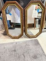 Front view of both octagonal mirrors showing full frames and glass
