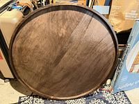 Full view of round wooden tabletop