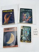 Group shot of all four publications showing covers