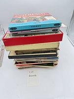 Stack of boxed record sets and LPs showing quantity