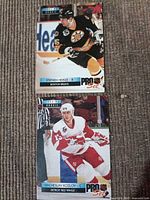 Both rookie cards front view: Stephen Heinze, Viacheslav Kozlov