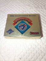 Front of gold outer box showing set title and Blue Jays logo