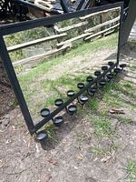 Front angled view showing full mirror and row of 12 tealight holders