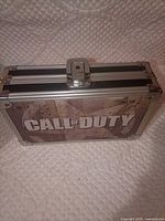 Front view of Call of Duty portable storage case showing graphic panel and latch