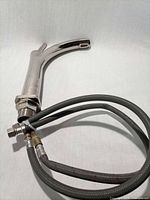 Full faucet with attached hoses