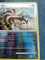 Front of Furret holographic card showing artwork, number 28/123, HP 90