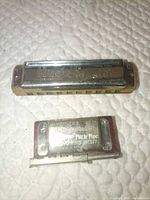 Top view showing both the Music Master harmonica and the Hohner Teutone pitch pipe