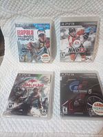 Front view of all four PS3 games in cases