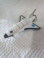 Top view of NASA space shuttle toy, closed cargo bay