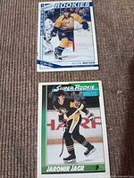 Front view of both cards together displaying player images and set titles