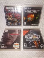 Front view of all four PS3 game cases
