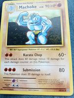 Front of Machoke card showing artwork, HP, attacks