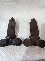 Both barn door roller hangers front view