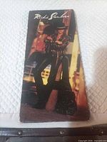 Front view of closed cardboard sleeve showing Richie Sambora image