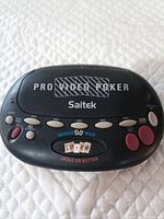 Front view of closed handheld showing brand and model