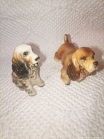Both cocker spaniel figurines front view