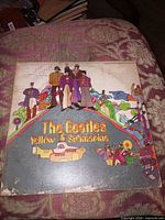 Front of Yellow Submarine sleeve showing artwork and wear