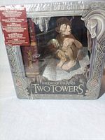 Front view of sealed Two Towers collector’s DVD gift set showing Gollum figure through window