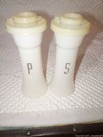 Front view of both shakers showing P and S letters