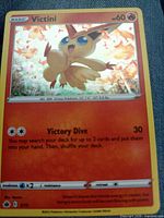 Front of Victini card showing artwork, HP, attack and set number 5/15