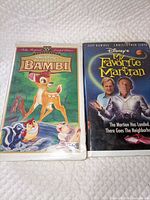 Front view of both VHS tapes showing cover art and titles