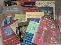 Group shot of all sixteen books showing covers and range of topics