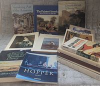 Front view of all fourteen books showing covers and spines