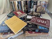 All 22 books arranged, showing variety of spines and covers