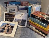 Group shot of entire assortment showing magazines, guides and stacked books