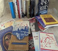 Group shot of books spread out, showing covers and spines