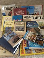 Group shot of all books laid flat showing front covers