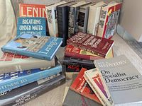 All 22 books arranged to show covers and spines