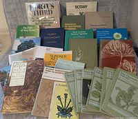 Overview of all 27 botany books spread in rows, titles visible